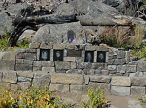 Stone plaques and memorial for four individuals who died on the Thirtymile Fire.