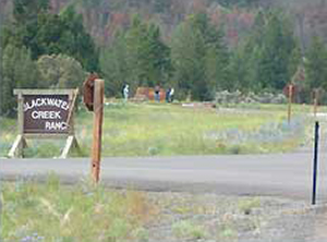 This sign along Highway 14/16/20 shows the turn-off to the Blackwater Lodge. This is also the turn-off for Forest Service Road 435 that goes to the upper trailhead in Blackwater Canyon.