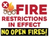 Fire Restrictions in effect: No Open Fires; fire prohibited symbol with flame and logs
