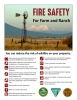 Fire Safety for Farm and ranch with photo of windmill, mountains and grassy field, with tips for reducing risk of wildfire