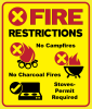 Fire Restrictions; Campfire icon with red prohibited X and No campfires text; grill icon with red prohibited X and no charcoal grills text; propane stove icon with OK checkmark and propane stoves OK text.