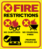 Fire Restrictions; Campfire icon with red prohibited X and No campfires text; grill icon with red prohibited X and no charcoal grills text; propane stove icon with OK checkmark and propane stoves OK text.